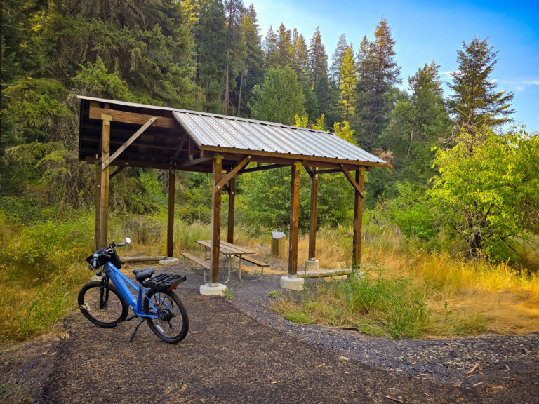 An e-bike parked by picnic area on Latah Trail